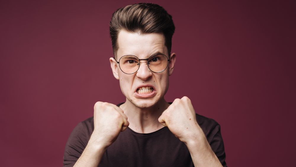 Angry Person Clenched Fists - DR. ARUNAVA DATTA Blog
